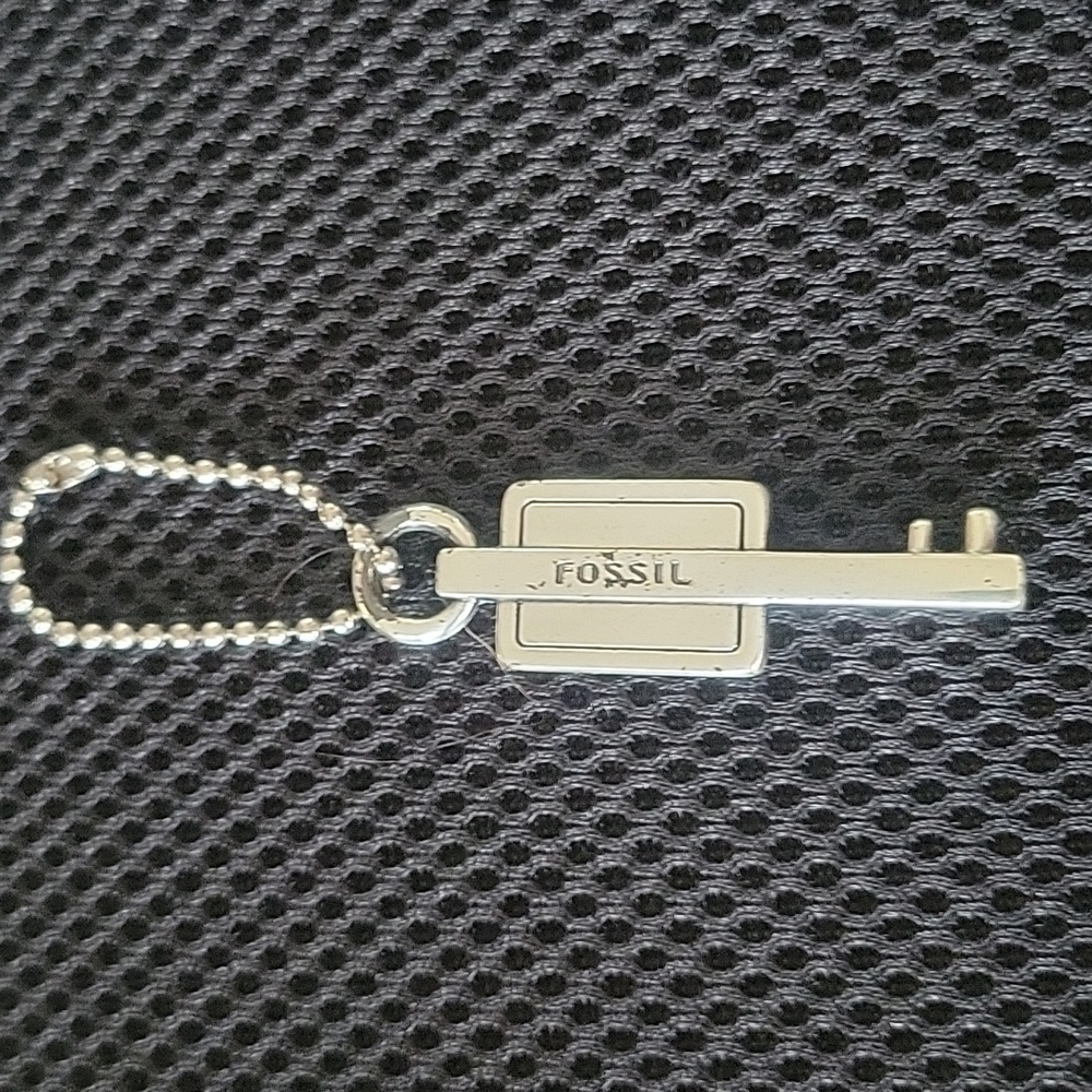 Fossil Key or purses holder